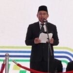 Direktur Utama PT Pegadaian Damar Latri Setiawan dalam upacara peringatan HUT PT Pegadaian yang digelar secara hibrid dan serentak di seluruh Indonesia.Foto: Dok PT Pegadaian.