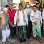 Menteri Koordinator Politik Hukum dan Keamanan, Mahfud MD (tengah). Foto: Dok Kemenkopolhukam