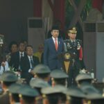 Presiden Joko Widodo (Jokowi) dalam upacara peringatan Hari Bhakti Adhyaksa yang ke-63 di Lapangan Badiklat Kejaksaan RI, Ragunan, Jakarta Selatan, Sabtu (22/7). Foto: Puspenkum Kejaksaan Agung