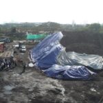 Suasana perusahaan pergudangan dan penyimpanan (stockpile) batubara yaitu PT. Trada Trans Indonesia dan PT. Tans Bara Energy di Jakarta Utara, saat diberikan sanksi administrasif oleh petugas Dinas Lingkungan Hidup DKI, Rabu (30/8). Foto: Ist