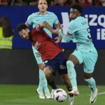 Kali ini dua gol kemenangan Barca dicetak oleh Jules Kounde (45+1') dan penalti Robert Lewandowski (85'). (AP Photo/Alvaro Barrientos)