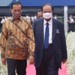 Foto: Presiden Joko Widodo (kiri) dan Ketua Umum Partai NasDem Surya Paloh (kanan)