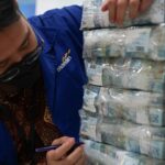 Bank Mandiri menyiapkan net kebutuhan uang tunai sekitar Rp 31,3 triliun untuk mengantisipasi peningkatan kebutuhan uang tunai di masyarakat selama 30 hari ke depan. Foto: Dok Bank Mandiri