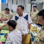 Kepala BPN Kota Depok Indra Gunawan di sela aktivitasnya memantau progres perkembangan alih media. (Foto BPN Kota Depok)